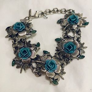 Vintage Mary DeMarco bracelet. Flowers topped with blue roses and dragonflies.